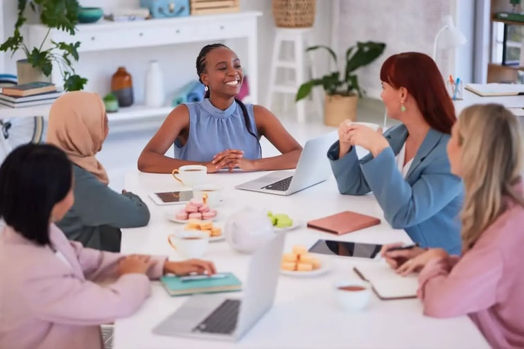 event planning team discussing event roi value