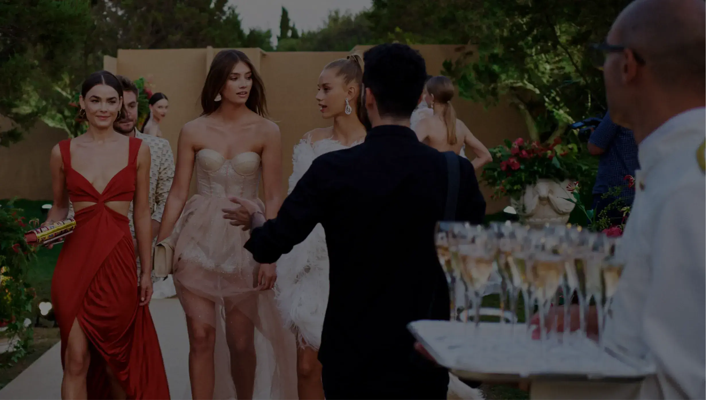 Guests being welcomed to a luxury, outdoor event